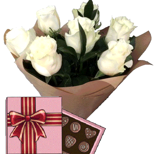 Фото товара 7 білих троянд із цукерками в Луцьку